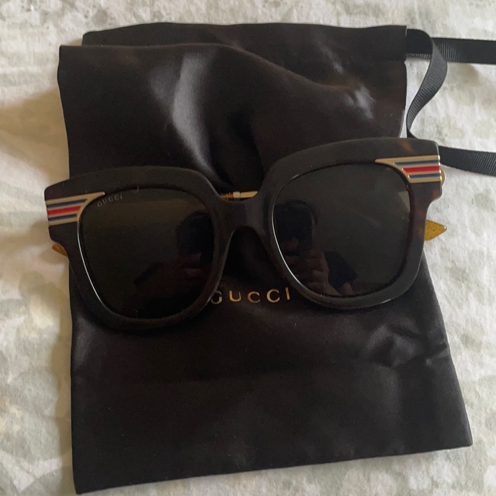 Gucci Sunglasses.